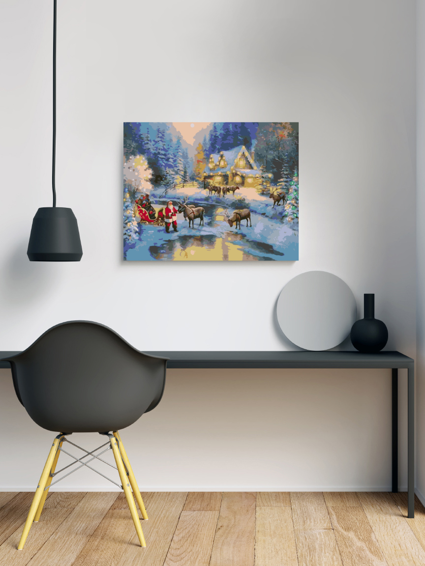 a painting of a christmas scene on a wall